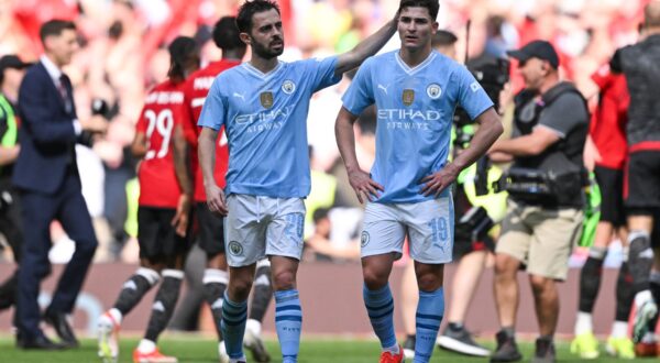 Manchester City's Portuguese midfielder #20 Bernardo Silva (L) consols Manchester City's Argentinian striker #19 Julian Alvarez after loosing the English FA Cup final football match between Manchester City and Manchester United at Wembley stadium, in London, on May 25, 2024. Manchester United wins 2 - 1 against Manchester City.,Image: 876375216, License: Rights-managed, Restrictions: NOT FOR MARKETING OR ADVERTISING USE / RESTRICTED TO EDITORIAL USE, Model Release: no, Credit line: JUSTIN TALLIS / AFP / Profimedia