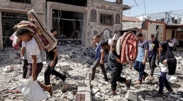 Palestinians evacuate with their belongings following an operation by the Israeli Special Forces in the Nuseirat camp, in the central Gaza Strip on June 8, 2024, amid the ongoing conflict between Israel and the Palestinian Hamas militant group.,Image: 879950959, License: Rights-managed, Restrictions: , Model Release: no, Credit line: Bashar TALEB / AFP / Profimedia