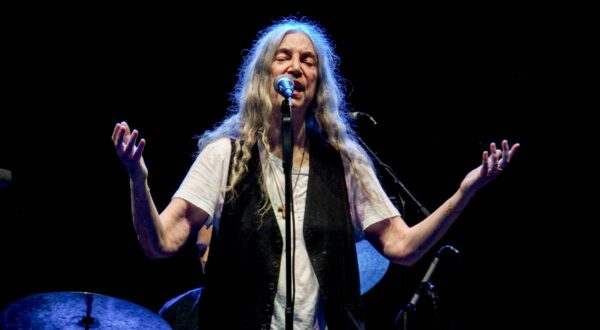 July 26, 2024, Vienna, Austria, Austria: American Singer-songwriter, PATTI SMITH, performs on outdoor stage with arms open  at the METAstadt, in Vienna as part of the PATTI SMITH QUARTET. .They played almost an hour an a half, playing her classics as well as paying tribute to her deceased husband, Fred Smith and late singer Kurt Cobain.,Image: 892671612, License: Rights-managed, Restrictions: , Model Release: no, Credit line: Bianca Otero / Zuma Press / Profimedia