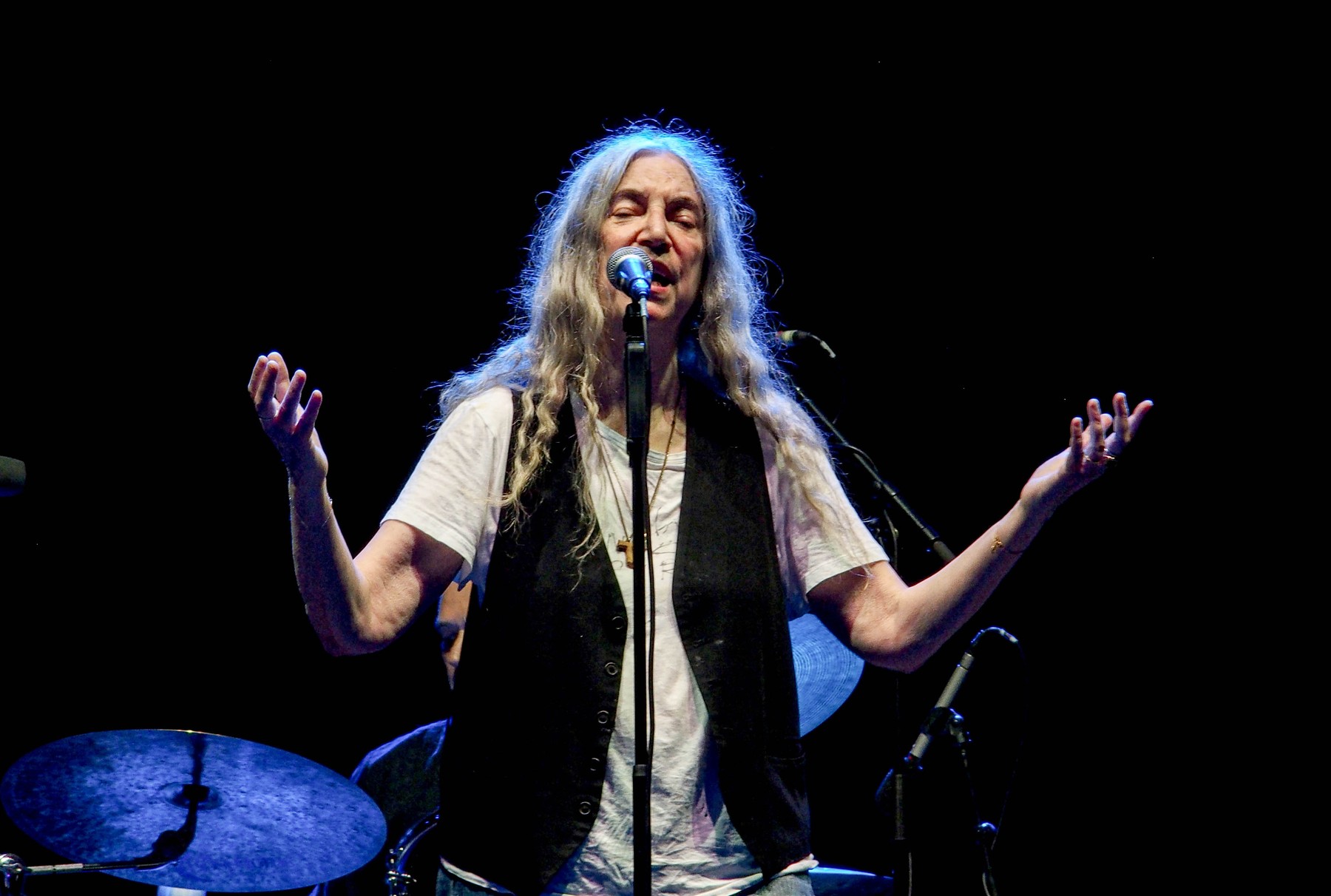 July 26, 2024, Vienna, Austria, Austria: American Singer-songwriter, PATTI SMITH, performs on outdoor stage with arms open  at the METAstadt, in Vienna as part of the PATTI SMITH QUARTET. .They played almost an hour an a half, playing her classics as well as paying tribute to her deceased husband, Fred Smith and late singer Kurt Cobain.,Image: 892671612, License: Rights-managed, Restrictions: , Model Release: no, Credit line: Bianca Otero / Zuma Press / Profimedia