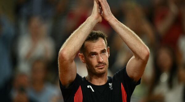 Britain's Andy Murray says goodbye after playing with Britain's Daniel Evans  against US' Taylor Fritz and US' Tommy Paul in their men's doubles quarter-final tennis match on Court Suzanne-Lenglen at the Roland-Garros Stadium during the Paris 2024 Olympic Games, in Paris on August 1, 2024.,Image: 895016440, License: Rights-managed, Restrictions: , Model Release: no, Credit line: CARL DE SOUZA / AFP / Profimedia