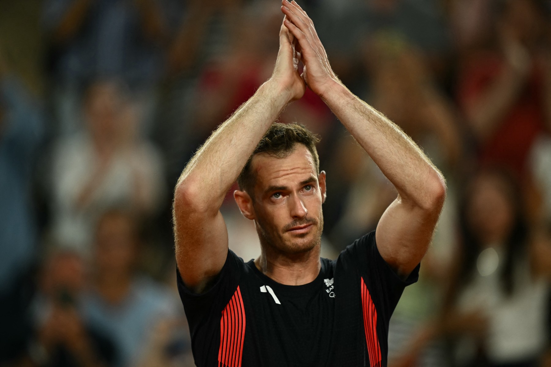 Britain's Andy Murray says goodbye after playing with Britain's Daniel Evans  against US' Taylor Fritz and US' Tommy Paul in their men's doubles quarter-final tennis match on Court Suzanne-Lenglen at the Roland-Garros Stadium during the Paris 2024 Olympic Games, in Paris on August 1, 2024.,Image: 895016440, License: Rights-managed, Restrictions: , Model Release: no, Credit line: CARL DE SOUZA / AFP / Profimedia