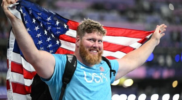 Gold medallist US' Ryan Crouser celebrates after the men's shot put final of the athletics event at the Paris 2024 Olympic Games at Stade de France in Saint-Denis, north of Paris, on August 3, 2024.,Image: 895720235, License: Rights-managed, Restrictions: , Model Release: no, Credit line: Kirill KUDRYAVTSEV / AFP / Profimedia