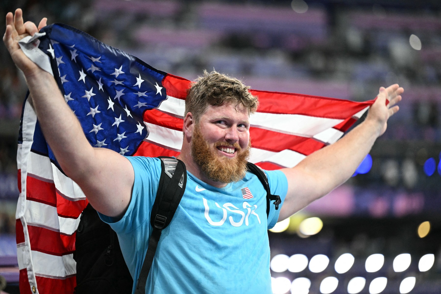 Gold medallist US' Ryan Crouser celebrates after the men's shot put final of the athletics event at the Paris 2024 Olympic Games at Stade de France in Saint-Denis, north of Paris, on August 3, 2024.,Image: 895720235, License: Rights-managed, Restrictions: , Model Release: no, Credit line: Kirill KUDRYAVTSEV / AFP / Profimedia