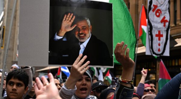 Pro-Palestinian demonstrators march through the streets of central business district to condemn the assassination of Hamas leader Ismail Haniyeh, recent Israeli strike on Lebanon and continued offensives in Gaza, during a rally in Sydney on August 4, 2024.,Image: 895799179, License: Rights-managed, Restrictions: , Model Release: no, Credit line: Saeed KHAN / AFP / Profimedia