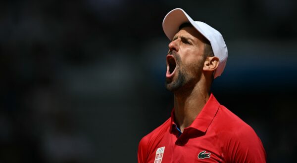 Serbia's Novak Djokovic reacts while playing Spain's Carlos Alcaraz during their men's singles final tennis match on Court Philippe-Chatrier at the Roland-Garros Stadium during the Paris 2024 Olympic Games, in Paris on August 4, 2024.,Image: 895875924, License: Rights-managed, Restrictions: , Model Release: no, Credit line: Patricia DE MELO MOREIRA / AFP / Profimedia