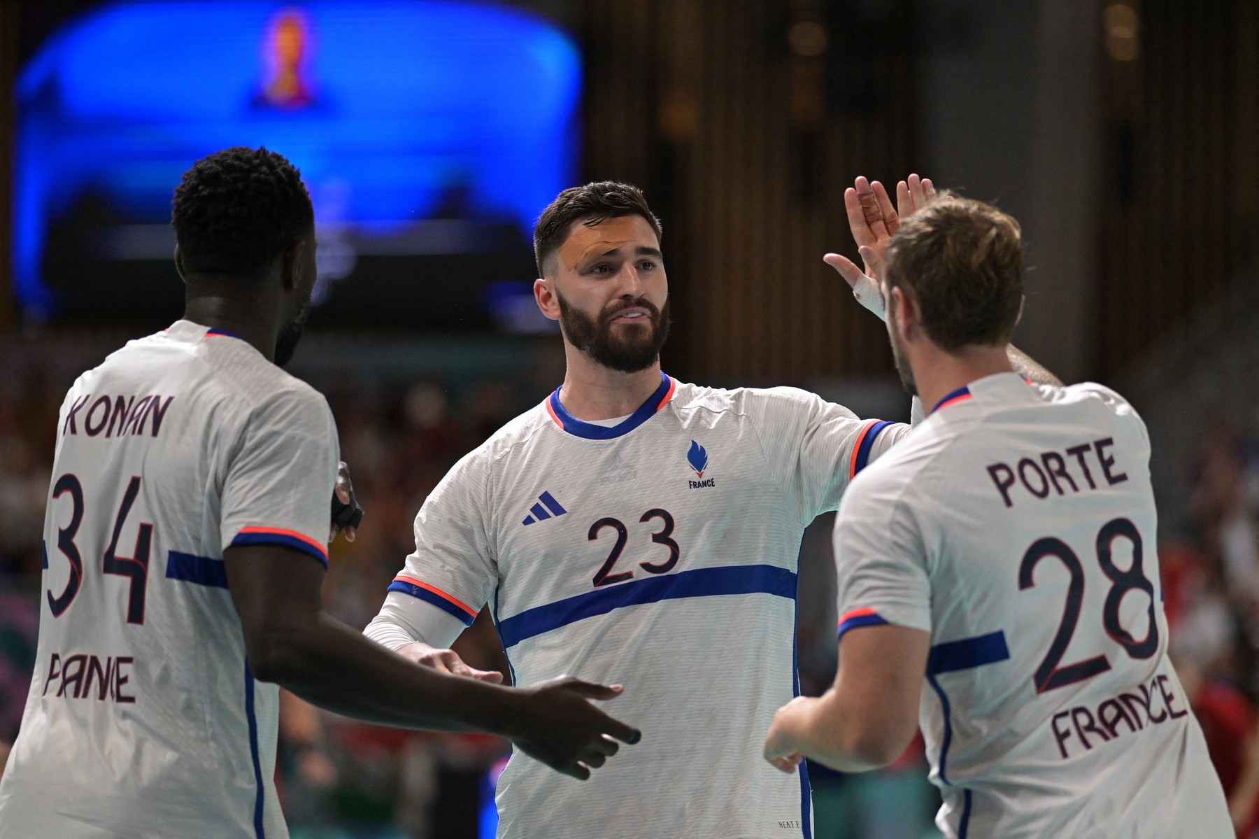 France's pivot #23 Ludovic Fabregas celebrates after scoring with teammates during the Men's Preliminary Round Group B handball match between Hungary and France of the Paris 2024 Olympic Games, at the Paris South Arena in Paris, on August 4, 2024.,Image: 895904011, License: Rights-managed, Restrictions: , Model Release: no, Credit line: Damien MEYER / AFP / Profimedia