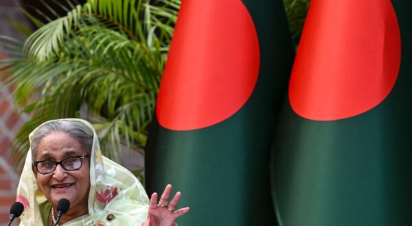 (FILES) Bangladesh's Prime Minister Sheikh Hasina gestures while speaking to the media, a day after she won the 12th parliamentary elections, in Dhaka on January 8, 2024. Thousands of Bangladeshi protesters stormed the palace of Prime Minister Sheikh Hasina in Dhaka on August 5, with a source telling AFP she had fled mass demonstrations demanding she quit.,Image: 896114373, License: Rights-managed, Restrictions: , Model Release: no, Credit line: INDRANIL MUKHERJEE / AFP / Profimedia