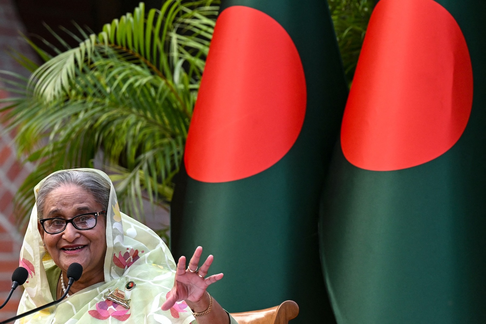 (FILES) Bangladesh's Prime Minister Sheikh Hasina gestures while speaking to the media, a day after she won the 12th parliamentary elections, in Dhaka on January 8, 2024. Thousands of Bangladeshi protesters stormed the palace of Prime Minister Sheikh Hasina in Dhaka on August 5, with a source telling AFP she had fled mass demonstrations demanding she quit.,Image: 896114373, License: Rights-managed, Restrictions: , Model Release: no, Credit line: INDRANIL MUKHERJEE / AFP / Profimedia