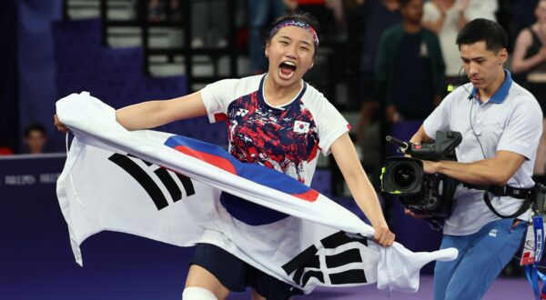 S. Korea wins gold in women's singles badminton An Se-young of South Korea reacts after winning the gold medal in the women's singles badminton event at the Paris Olympics at Porte de La Chapelle Arena in Paris on Aug. 5, 2024.,Image: 896351793, License: Rights-managed, Restrictions: , Model Release: no, Credit line: Yonhap News / Newscom / Profimedia