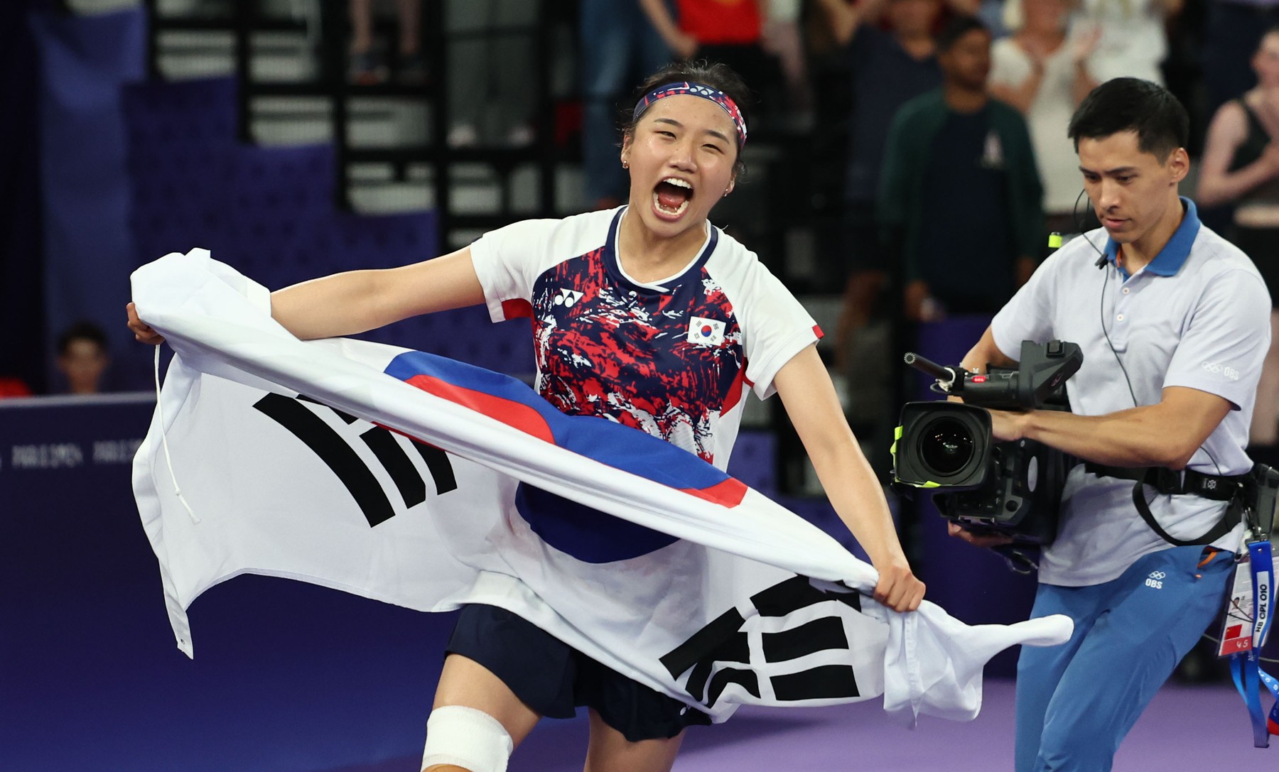 S. Korea wins gold in women's singles badminton An Se-young of South Korea reacts after winning the gold medal in the women's singles badminton event at the Paris Olympics at Porte de La Chapelle Arena in Paris on Aug. 5, 2024.,Image: 896351793, License: Rights-managed, Restrictions: , Model Release: no, Credit line: Yonhap News / Newscom / Profimedia