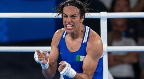 PARIS, FRANCE - AUGUST 6: Imane Khelif (blue) of Algeria celebrates after defeating Janjaem Suwannapheng (not seen) of Thailand congratulate at the end of the women's 66kg semi-final boxing match during the Paris 2024 Olympic Games at the Roland-Garros Stadium, in Paris, France on August 6, 2024. Khelif wins the match and advanced to final. Aytac Unal / Anadolu/ABACAPRESS.COM,Image: 896646442, License: Rights-managed, Restrictions: , Model Release: no, Credit line: AA/ABACA / Abaca Press / Profimedia