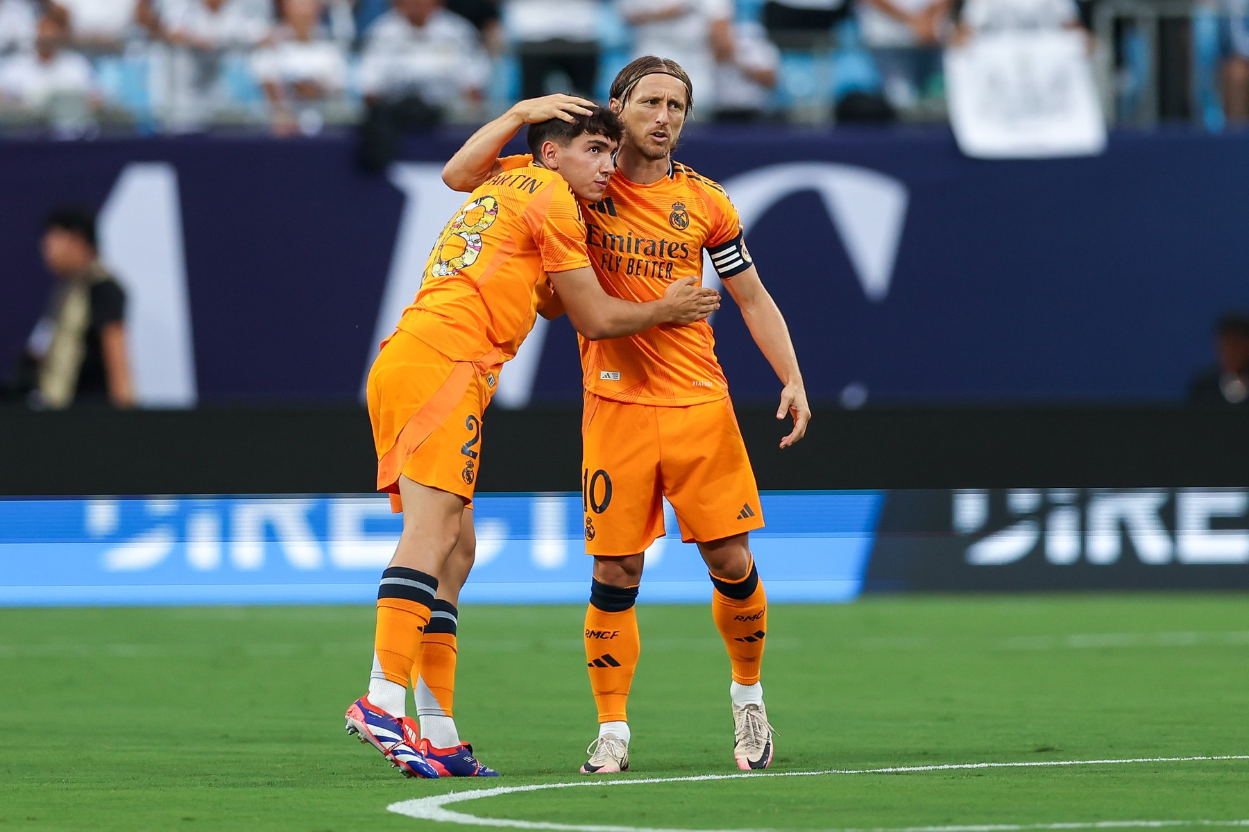 August 6, 2024, Charlotte, North Carolina, U.S: Real Madrid midfielder LUKA MODRIC (10) and Real Madrid midfielder MARIO MARTIN (28) embrace before the Soccer Champions Tour Real Madrid vs Chelsea FC match at Bank of America Stadium in Charlotte, NC on August 6, 2024.,Image: 896662131, License: Rights-managed, Restrictions: , Model Release: no, Credit line: Cory Knowlton / Zuma Press / Profimedia