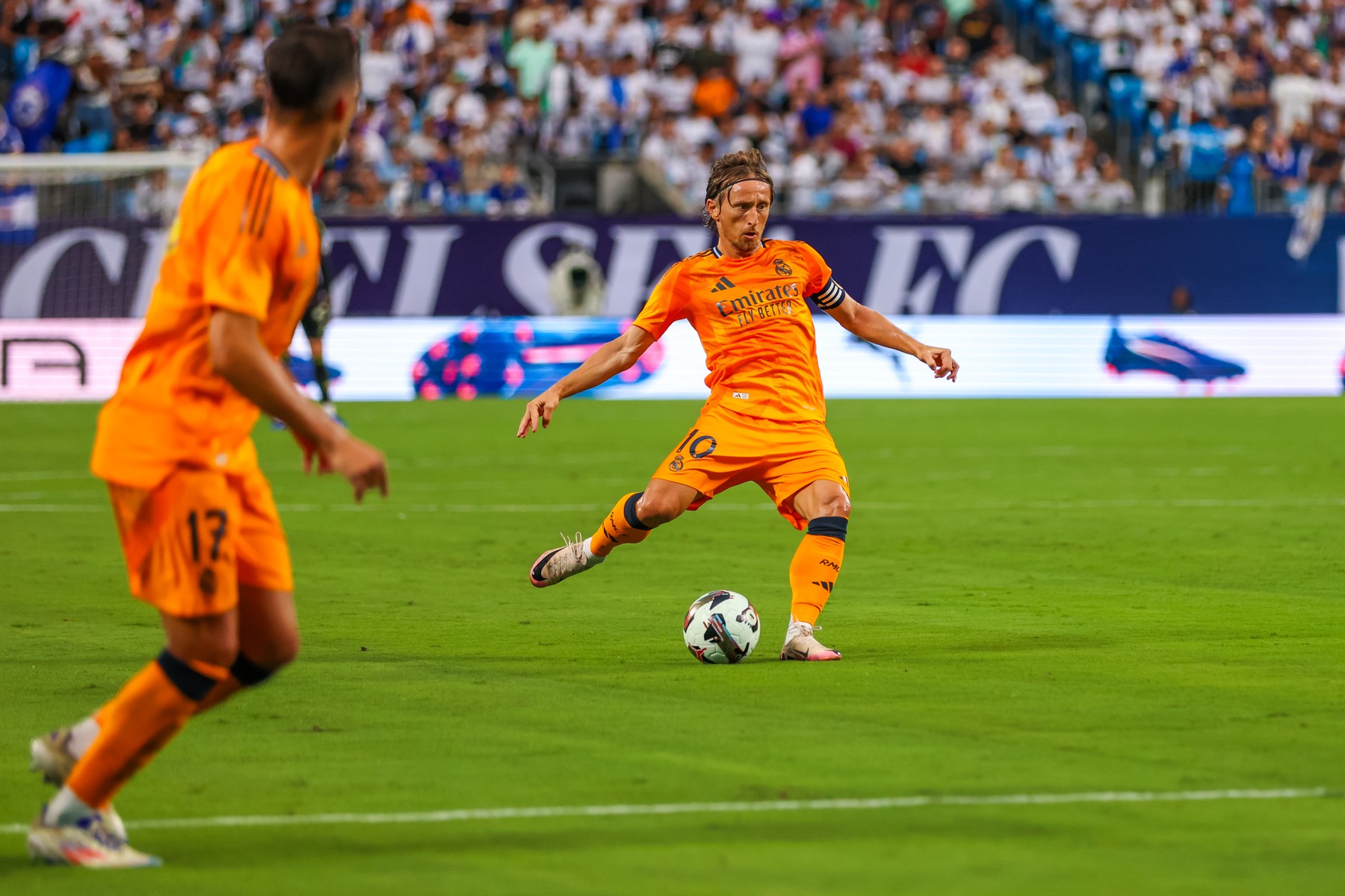 CHARLOTTE, NC - AUGUST 06: Luka Modrić #10 of Real Madrid kicks the ball during the DIRECTV Soccer Champions Tour against Chelsea at Bank of America Stadium on Aug 6, 2024 in Charlotte, NC.,Image: 896663097, License: Rights-managed, Restrictions: FOR EDITORIAL USE ONLY. Icon Sportswire (A Division of XML Team Solutions) reserves the right to pursue unauthorized users of this image. If you violate our intellectual property you may be liable for: actual damages, loss of income, and profits you derive from the use of this image, and, where appropriate, the costs of collection and/or statutory damages up to $150,000 (USD)., Model Release: no, Credit line: David Jensen/Icon Sportswire / Newscom / Profimedia