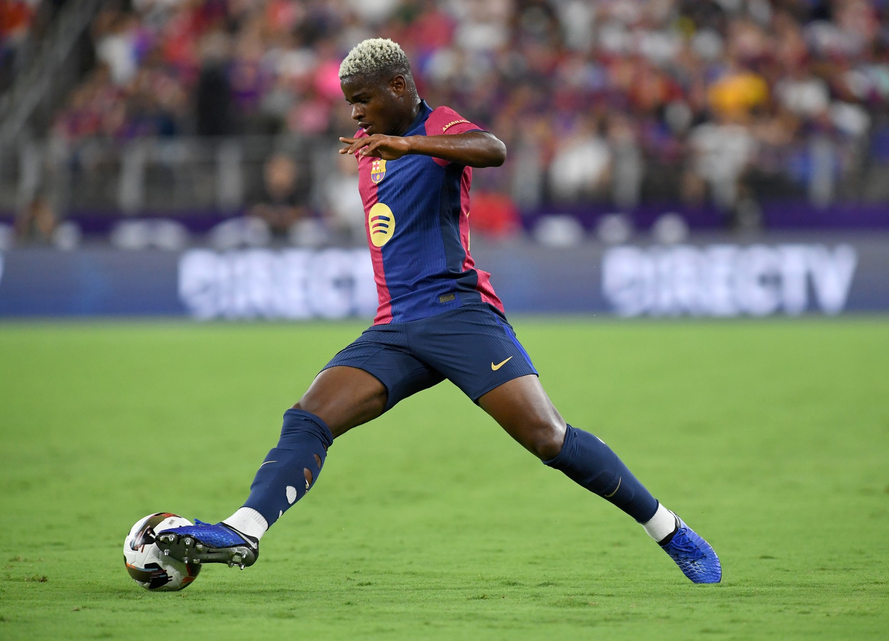 BALTIMORE, MD - AUGUST 06: Barcelona midfielder Mikayil Faye (25) dribbles during the Barcelona versus AC Milan 2024 Soccer Champions Tour match on August 6, 2024 at M&T Bank Stadium in Baltimore, MD.,Image: 896877170, License: Rights-managed, Restrictions: FOR EDITORIAL USE ONLY. Icon Sportswire (A Division of XML Team Solutions) reserves the right to pursue unauthorized users of this image. If you violate our intellectual property you may be liable for: actual damages, loss of income, and profits you derive from the use of this image, and, where appropriate, the costs of collection and/or statutory damages up to $150,000 (USD)., Model Release: no, Credit line: Randy Litzinger/Icon Sportswire / Newscom / Profimedia