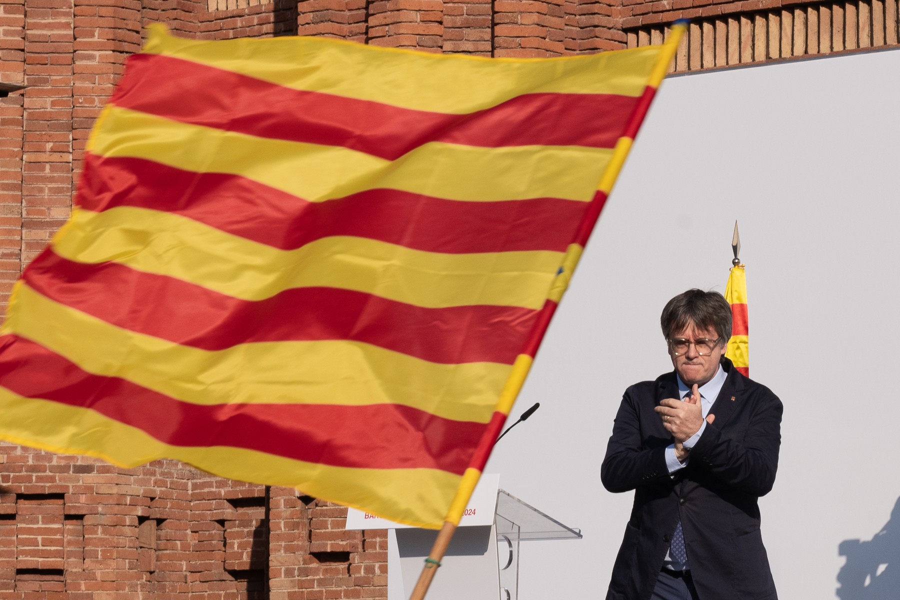 August 8, 2024, Barcelona (Catalonia, Spain: The former president of the Generalitat de Catalunya Carles Puigdemont applauds during a welcome rally organized by pro-independence organizations at Passeig Lluís Companys, on August 8, 2024, in Barcelona, Catalonia (Spain). Said rally has been called by pro-independence entities, with the attendance of Junts, ERC, CUP, ANC, Ã’mnium Cultural, CDR and Associació de Municipis per la IndependÃ¨ncia (AMI). Puigdemont plans to attend this welcoming act to then participate in the plenary session of investiture of the leader of the PSC, almost seven years after settling in Belgium due to the judicial consequences of the 'procés', and with an arrest warrant...AUGUST 08;2024..David Zorrakino / Europa Press..08/08/2024,Image: 896997507, License: Rights-managed, Restrictions: * Spain Rights OUT *, Model Release: no, Credit line: David Zorrakino / Zuma Press / Profimedia