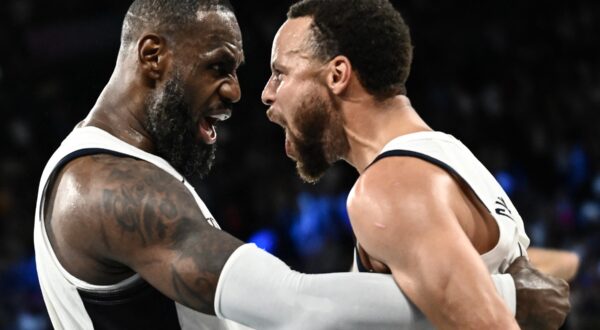 USA's #06 LeBron James (L) celebrates with USA's #04 Stephen Curry at the end of the men's semifinal basketball match between USA and Serbia during the Paris 2024 Olympic Games at the Bercy  Arena in Paris on August 8, 2024.,Image: 897173913, License: Rights-managed, Restrictions: , Model Release: no, Credit line: Aris MESSINIS / AFP / Profimedia