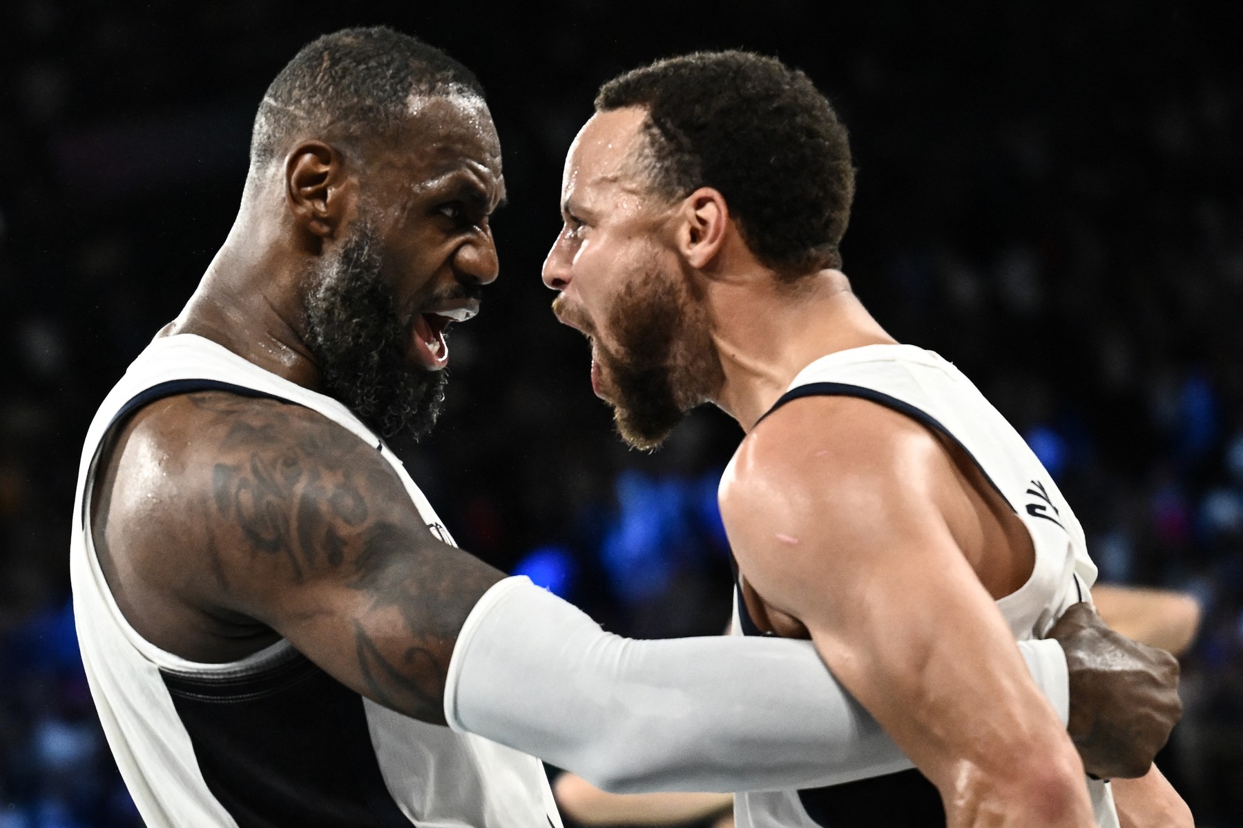 USA's #06 LeBron James (L) celebrates with USA's #04 Stephen Curry at the end of the men's semifinal basketball match between USA and Serbia during the Paris 2024 Olympic Games at the Bercy  Arena in Paris on August 8, 2024.,Image: 897173913, License: Rights-managed, Restrictions: , Model Release: no, Credit line: Aris MESSINIS / AFP / Profimedia