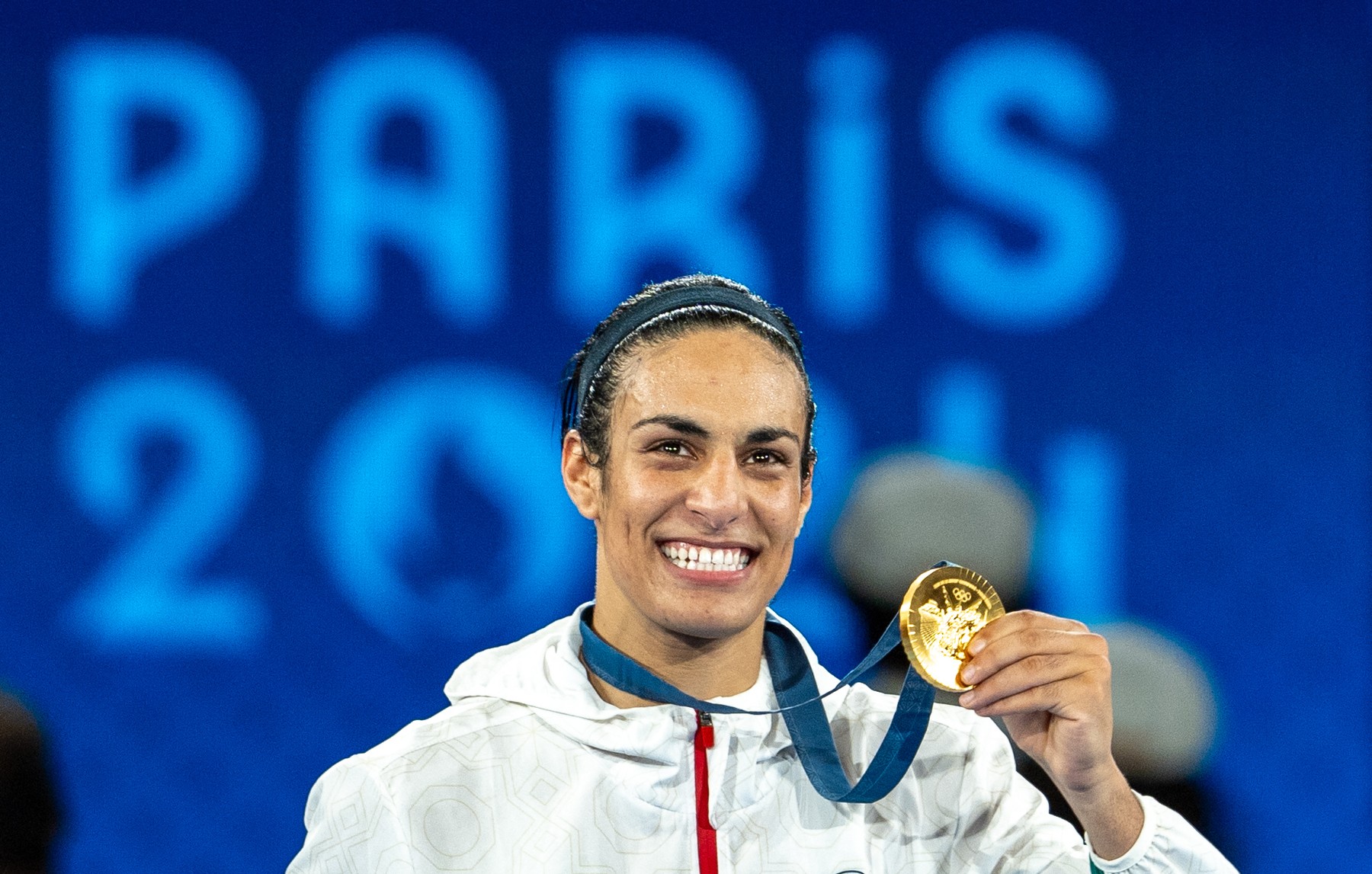 PARIS, FRANCE - AUGUST 09: Imane Khelif of Team Algeria celebrates as she wins gold medal after defeating Liu Yang (blue) of China in the Boxing Women's 66kg Final match on day fourteen of the Olympic Games Paris 2024 at Roland Garros on August 09, 2024 in Paris, France. Aytac Unal / Anadolu/ABACAPRESS.COM,Image: 897490225, License: Rights-managed, Restrictions: , Model Release: no, Credit line: AA/ABACA / Abaca Press / Profimedia