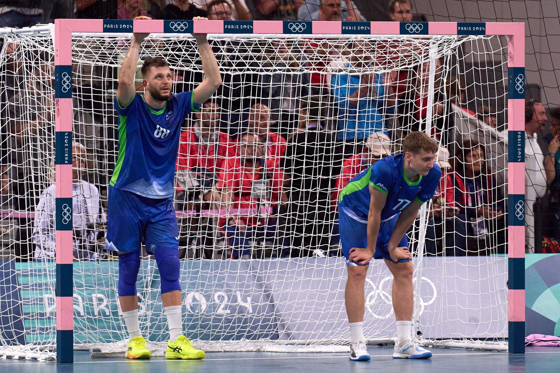 LILLE, Aug. 9, 2024  -- Aleks Vlah (L) and Domen Novak of Slovenia react after the men's semifinal of handball between Slovenia and Denmark at the Paris 2024 Olympic Games in Lille, France, on Aug. 9, 2024.,Image: 897516006, License: Rights-managed, Restrictions: , Model Release: no, Credit line: Meng Dingbo / Xinhua News / Profimedia