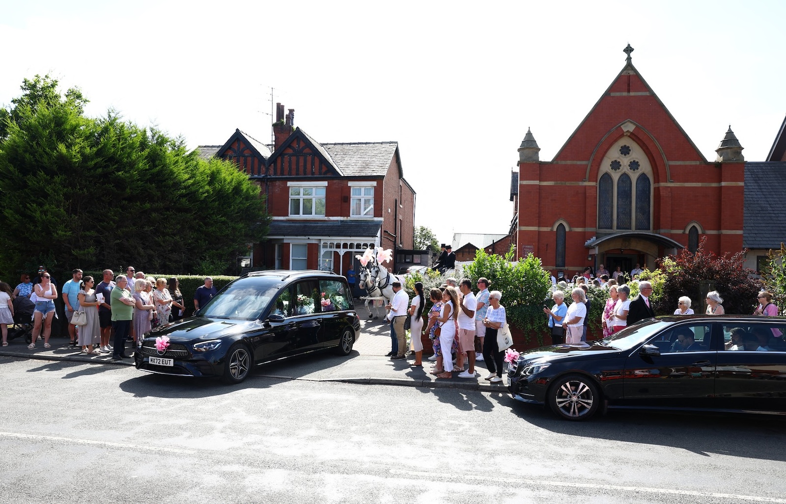 The funeral cortege leaves from St Patrick's Catholic Church in Southport, northwest England, on August 11, 2024, following a funeral service for nine-year-old Alice Da Silva Aguiar. Alice Da Silva Aguiar, Bebe King, and Elsie Dot Stancombe were all murdered during a July 29 knife attack at a Taylor Swift-themed dance party that also left another 10 people injured.,Image: 897824671, License: Rights-managed, Restrictions: , Model Release: no, Credit line: ANNABEL LEE-ELLIS / AFP / Profimedia