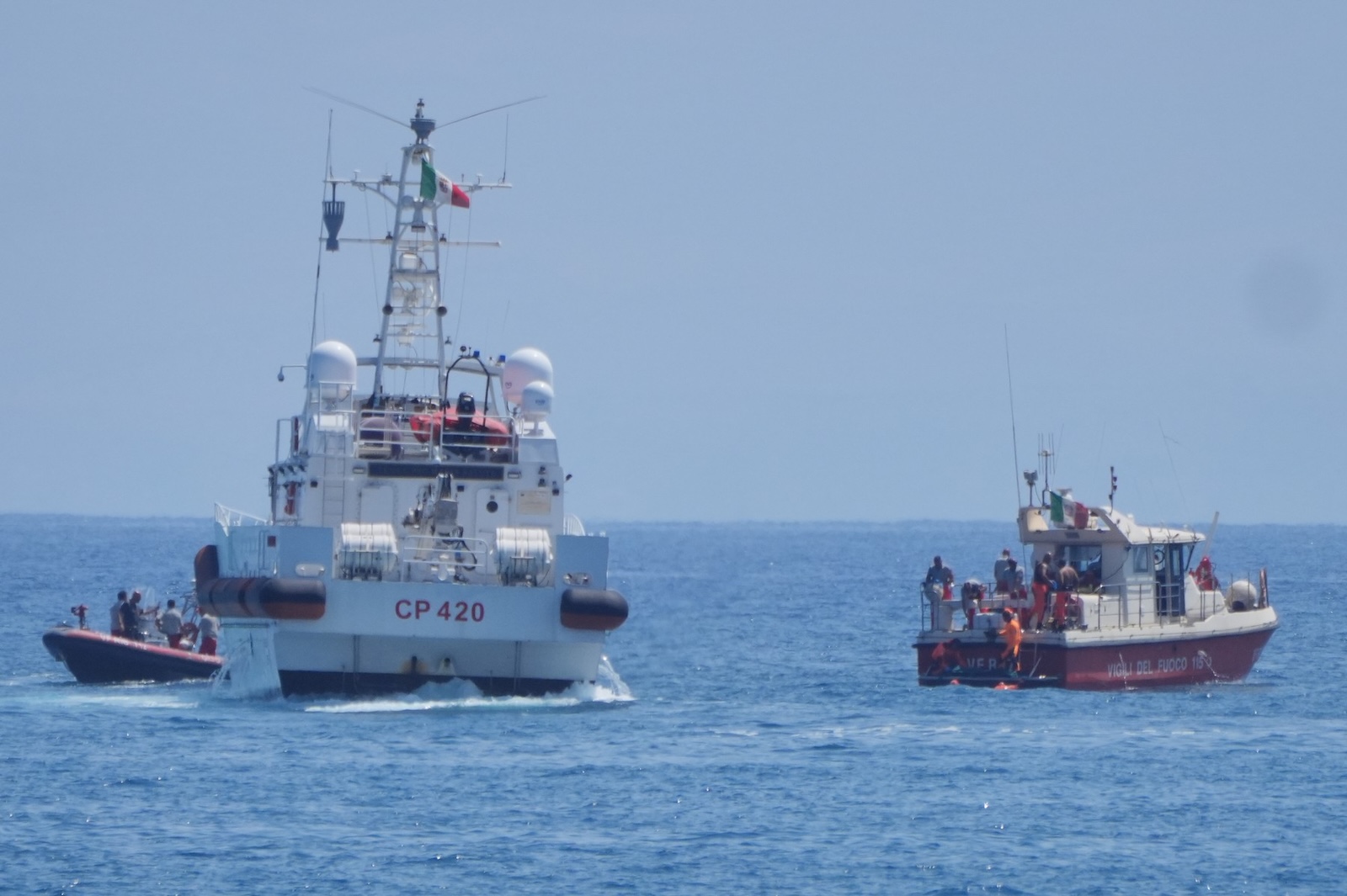 Members of the rescue team placed a body bag onto the lower half of the deck of the fire service dive team boat on the fifth day of the search and recovery operation, after the luxury yacht Bayesian sank in a storm on Monday whilst moored around half a mile off the coast of Porticello, Sicily. Picture date: Friday August 23, 2024.,Image: 900944872, License: Rights-managed, Restrictions: , Model Release: no, Credit line: Jonathan Brady / PA Images / Profimedia