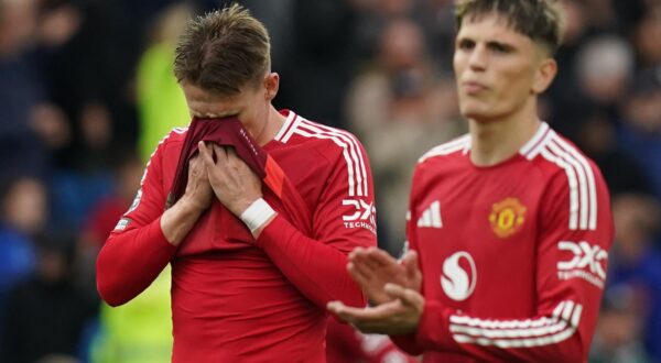 Manchester United's Scott McTominay (left) looks dejected after the Premier League match at the American Express Stadium, Brighton. Picture date: Saturday August 24, 2024.,Image: 901206187, License: Rights-managed, Restrictions: EDITORIAL USE ONLY No use with unauthorised audio, video, data, fixture lists, club/league logos or "live" services. Online in-match use limited to 120 images, no video emulation. No use in betting, games or single club/league/player publications., Model Release: no, Credit line: Gareth Fuller / PA Images / Profimedia