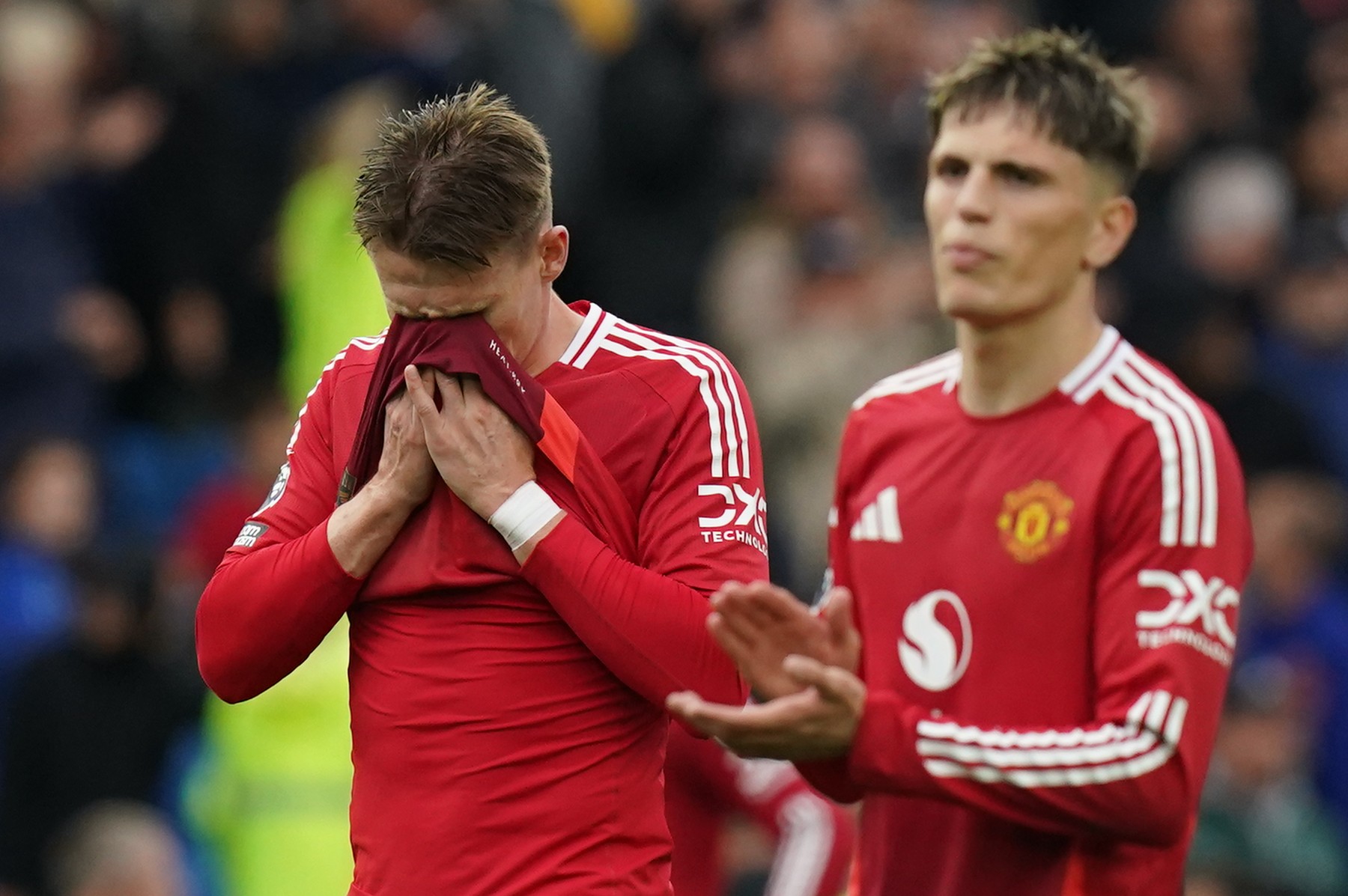 Manchester United's Scott McTominay (left) looks dejected after the Premier League match at the American Express Stadium, Brighton. Picture date: Saturday August 24, 2024.,Image: 901206187, License: Rights-managed, Restrictions: EDITORIAL USE ONLY No use with unauthorised audio, video, data, fixture lists, club/league logos or "live" services. Online in-match use limited to 120 images, no video emulation. No use in betting, games or single club/league/player publications., Model Release: no, Credit line: Gareth Fuller / PA Images / Profimedia