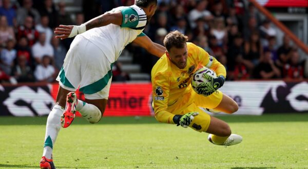 Newcastle United's Brazilian striker #07 Joelinton vies for the ball with Bournemouth's Brazilian goalkeeper #01 Neto during the English Premier League football match between Bournemouth and Newcastle United at the Vitality Stadium in Bournemouth, southern England on August 25, 2024.,Image: 901455672, License: Rights-managed, Restrictions: RESTRICTED TO EDITORIAL USE. No use with unauthorized audio, video, data, fixture lists, club/league logos or 'live' services. Online in-match use limited to 120 images. An additional 40 images may be used in extra time. No video emulation. Social media in-match use limited to 120 images. An additional 40 images may be used in extra time. No use in betting publications, games or single club/league/player publications., Model Release: no, Credit line: Adrian DENNIS / AFP / Profimedia