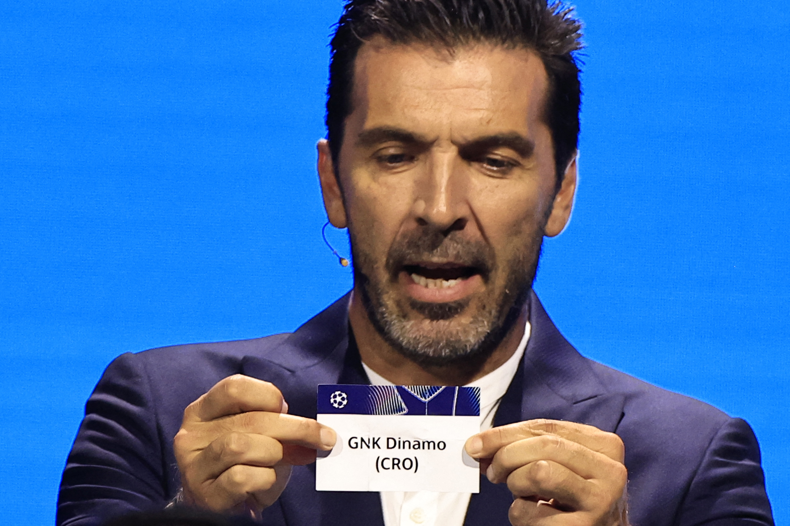 Italy's former goalkeeper Gianluigi Buffon shows the paper slip of GNK Dinamo (CRO) during the group stage of the 2024-2025 UEFA Champions League football tournament, at the Grimaldi Forum in Monaco on August 29, 2024.,Image: 902913935, License: Rights-managed, Restrictions: , Model Release: no, Credit line: Valery HACHE / AFP / Profimedia