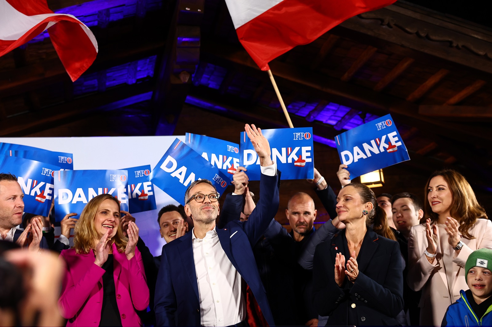 epaselect epa11632976 Chairman and top candidate of the Freedom Party of Austria (FPOe) Herbert Kickl (C) celebrates during FPOe election event after parliamentary elections in Vienna, Austria, 29 September 2024. Austria's far-right Freedom Party is heading for an unprecedented general election victory under leader Herbert Kickl, according to projections.  EPA/FILIP SINGER