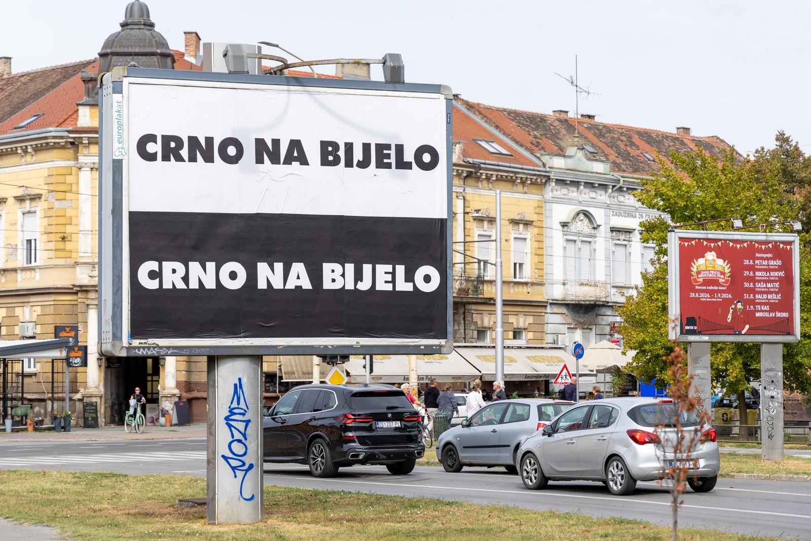 10.09.2024., Osijek - Plakat "Crno na bijelo" kojim Mario Radic najavljuje osnivanje nove stranke. Photo: Borna Jaksic/PIXSELL