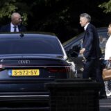 epa11547892 Dutch Prime Minister Dick Schoof (C) and State Secretary for Primary Education and Emancipation Marielle Paul (R) leave after a meeting of the Dutch cabinet, at the Catshuis in The Hague, the Netherlands, 13 August 2024. Dutch cabinet members held an informal meeting, the first since their vacation, at the Catshuis, the official residence of the Dutch prime minister, due to the renovation of the Binnenhof.  EPA/RAMON VAN FLYMEN