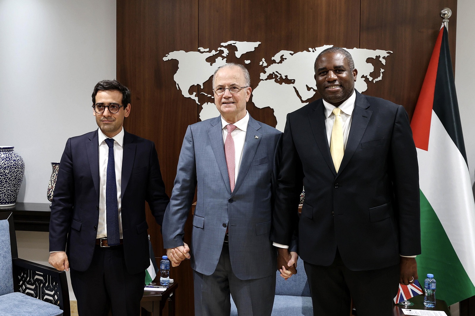 epa11551540 Palestinian Prime Minister Mohammed Mustafa C) meets with British Foreign Secretary David Lammy (R) and French Foreign Minister Stephane Sejourne (L) during their visit to the West Bank city of Ramallah, 16 August 2024. As Gaza ceasefire talks in presence of mediators from Qatar, Egypt and the US enter their second day, British Foreign Secretary David Lammy and his French counterpart Stephane Sejourne went on 16 August on a joint visit to Israel and to the West Bank. Their visit comes in an effort to push for a ceasefire in Gaza and de-escalation of conflict risks in the region, in the context of an expected Iranian retaliation on Israel after the killing of Hamas leader Ismail Haniyeh in Tehran on 31 July 2024.  EPA/SHADI HATEM