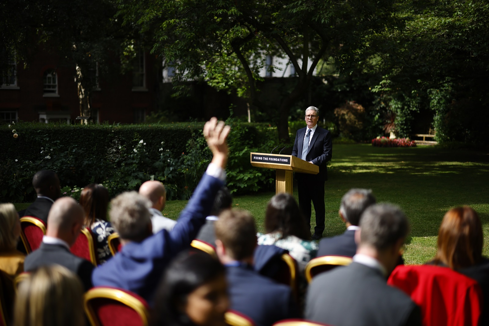 epa11566630 British Prime Minister Sir Keir Starmer takes questions after his speech in the Rose Garden of 10 Downing Street in London, Britain, 27 August 2024. The prime minister reflected on the riots the country experienced earlier in August and warned that 'things will get worse before we get better'. In the audience are around 50 members of the public that Starmer met whilst campaigning for the general election.  EPA/TOLGA AKMEN / POOL