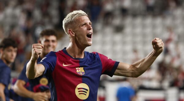 epa11567904 FC Barcelona's Dani Olmo celebrates winning the Spanish LaLiga match between Rayo Vallecano and FC Barcelona, at the Vallecas Stadium, in Madrid, Spain, 27 August 2024.  EPA/Mariscal