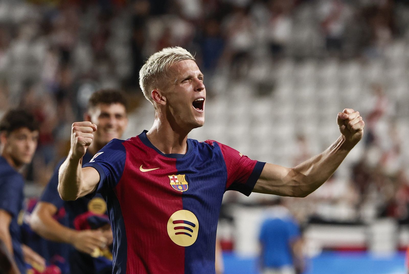 epa11567904 FC Barcelona's Dani Olmo celebrates winning the Spanish LaLiga match between Rayo Vallecano and FC Barcelona, at the Vallecas Stadium, in Madrid, Spain, 27 August 2024.  EPA/Mariscal