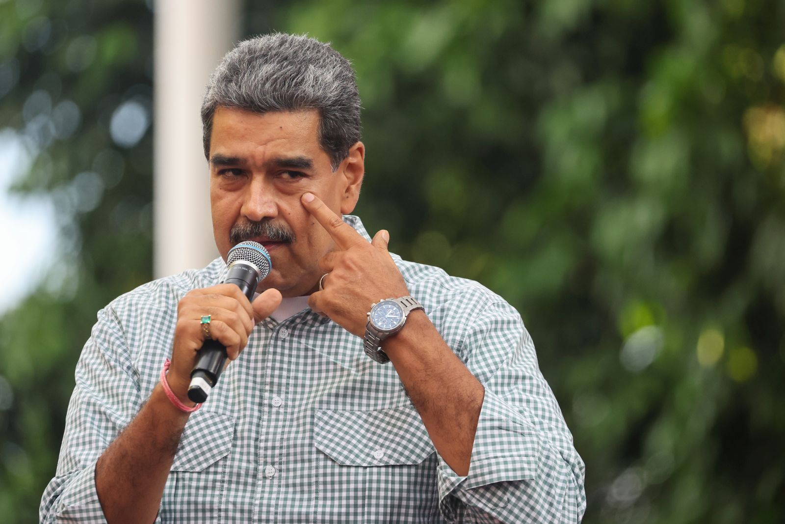 epa11570312 Venezuelan President, Nicolas Maduro, speaks to his followers in Caracas, Venezuela, 28 August 2024. Chavista supporters celebrated on 28 August in the streets of Venezuela the re-election of President Nicolas Maduro in the elections held a month ago, as Venezuelan opposition leader Maria Corina Machado also held a rally in Caracas protesting against the official results of Venezuela's presidential elections, and claiming the victory of Edmundo Gonzalez Urrutia.  EPA/MIGUEL GUTIERREZ