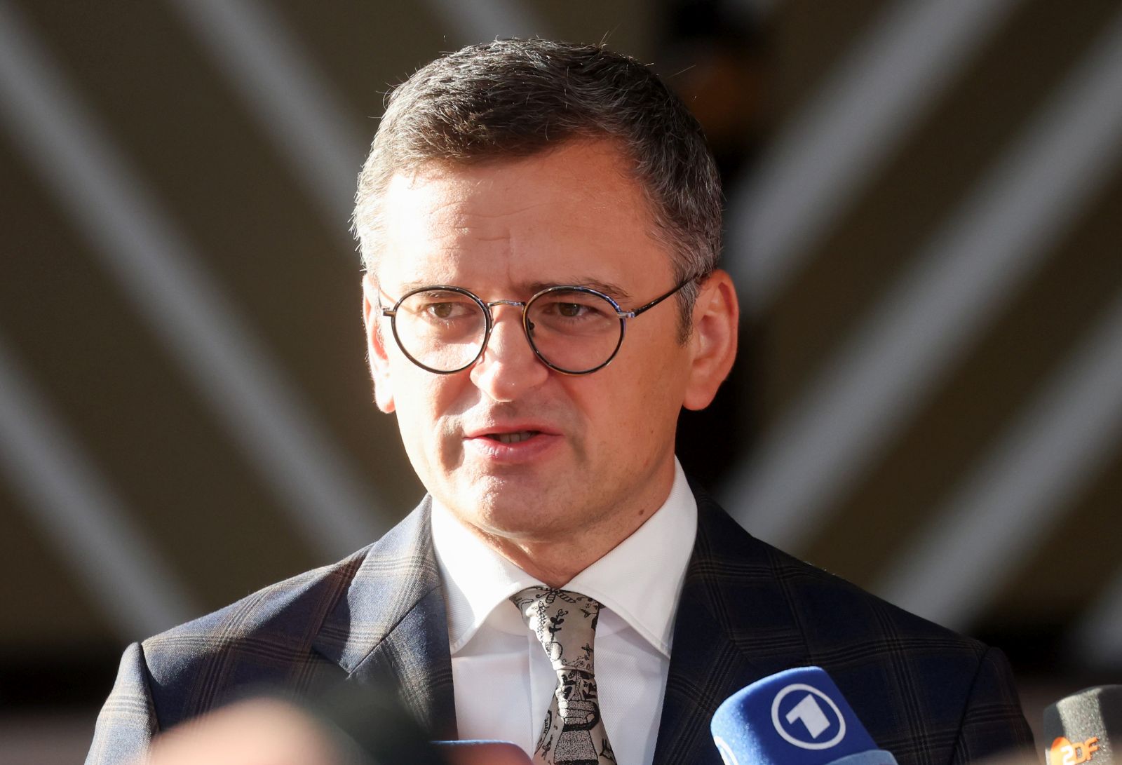 epa11570622 Ukrainian Foreign Minister Dmytro Kuleba speaks to the media ahead of an informal meeting of European Foreign Affairs Ministers in Brussels, Belgium, 29 August The informal council usually takes place in the country chairing the rotating presidency of the EU. But following tensions between Prime Minister of Hungary Viktor Orban and the EU, the EU's informal foreign and defense ministerial meetings on 29-30 August, respectively, will take place in Brussels instead of Budapest. EU Foreign Ministers will discuss Russia’s aggression against Ukraine and on global outreach, the state of play of EU-Turkey relations and regional and global issues of shared interest, and the situation in the Middle East on the background of the latest escalation of tensions in the region.  EPA/OLIVIER HOSLET