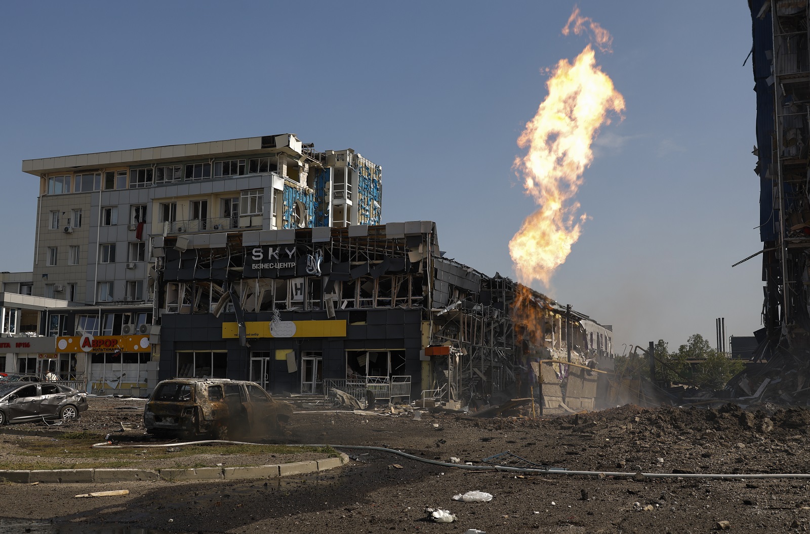 epaselect epa11577836 Ukrainian rescuers work at the site of a missile strike on a shopping mall in Kharkiv, northeastern Ukraine, 01 September 2024, amid the Russian invasion. At least 40 people have been injured, including five children, after a Russian rocket attack hit several civilian sites in Kharkiv, the head of the Kharkiv Military Administration Oleg Synegubov wrote on telegram. Russian troops entered Ukrainian territory on 24 February 2022, starting a conflict that has provoked destruction and a humanitarian crisis.  EPA/SERGEY KOZLOV