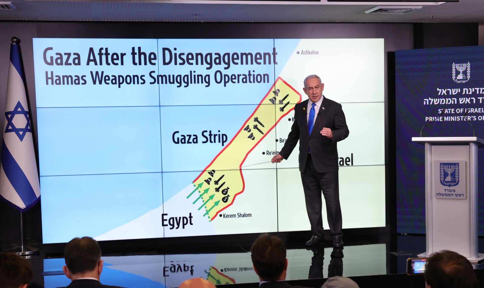 epa11584958 Israeli Prime Minister Benjamin Netanyahu stands before a map of the Gaza Strip during a press conference for the international media at the Government Press office in Jerusalem, 04 September 2024. The Israeli Prime Minister said that in order prevent Hamas from rearming , Israel 'must have control' over Philadelphi Corridor, a narrow strip of land along the border between the Gaza Strip and Egypt.  EPA/ABIR SULTAN EPA POOL