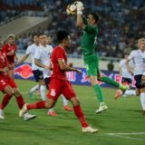 epa11587453 Russia’s goal keeper Andrey Lunyov (C) catches the ball during the international LPBank Cup 2024 soccer match between Vietnam and Russia at My Dinh stadium in Hanoi, Vietnam, 05 September 2024  EPA/LUONG THAI LINH