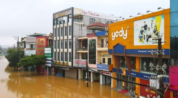 epa11595434 A handout photo made available by Vietnam News Agency shows flood waters surrounding buildings in Yen Bai city, Yen Bai Province, Vietnam 09 September 2024 (issued 10 September 2024). According to sate media, at least 3,500 households have been evacuated in Yen Bai due to floods, after powerful Typhoon Yagi hit northern Vietnam over the weekend  EPA/VIETNAM NEWS AGENCY/TUAN ANH VIETNAM OUTHANDOUT EDITORIAL USE ONLY/NO SALES