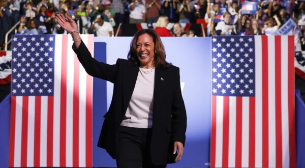 epa11600958 Vice President and Democratic presidential nominee Kamala Harris takes to the stage as she participates in a campaign rally at the Bojangles Arena in Charlotte, North Carolina, USA, 12 September 2024. Harris is running against former US President and Republican nominee Donald Trump.  EPA/ERIK S. LESSER