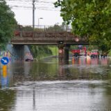 epa11613291 A car is trapped in the Celle underpass following the wave of bad weather that hit central Italy, in Rimini, Emilia-Romagna region, Italy, 19 September 2024. The low-pressure system Boris brought heavy rain to central and eastern Europe starting on 11 September 2024 with five times the average monthly rainfall for September within a few days according to the EU's Copernicus programme. Hundreds of thousands were evacuated from their homes across the region and more than twenty people died according to the latest reports from the countries affected.  EPA/DORIN MIHAI