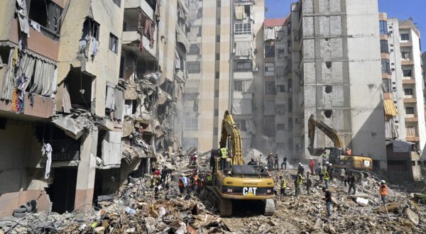 epa11616876 Emergency workers use excavators to clear the rubble at the site which was targeted by an Israeli strike the previous day, in the southern suburb of Beirut, Lebanon, 21 September 2024. At least thirty-one people, including Hezbollah commander Ibrahim Akil, were killed and dozens injured in an attack which targeted the southern suburb of Beirut, according to the Lebanese Ministry of Health. The Israeli military stated on 20 September that it conducted a 'targeted strike' in Beirut, claiming that the 'Hezbollah Commanders we eliminated today' had been planning attacks on northern areas of Israel.  EPA/WAEL HAMZEH