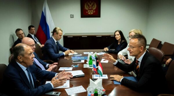 epa11625405 A handout photo made available by the Hungarian Ministry of Foreign Affairs and Trade shows Hungarian Minister of Foreign Affairs and Trade Peter Szijjarto (R) and Russian Foreign Minister Sergey Lavrov (L) sitting at the conference table during their meeting on the sidelines of the General Debate of the 79th session of the General Assembly of the United Nations in New York, New York, USA, 25 September 2024 (issued 26 September 2024).  EPA/MFAT HANDOUT  HANDOUT EDITORIAL USE ONLY/NO SALES