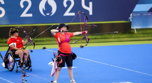 PARIS, FRANCE - AUGUST 31: Oznur Cure Girdi (rear) of Team Turkiye competes against Jodie Grinham of Great Britain (left) during their women's individual compound open semi-final match on day three of the Paris 2024 Paralympic Games at Eplanade des Invalides in Paris, France on August 31, 2024. Ahmet Izgi / Anadolu/ABACAPRESS.COM,Image: 903531759, License: Rights-managed, Restrictions: , Model Release: no, Credit line: AA/ABACA / Abaca Press / Profimedia