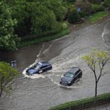 SHANGHAI, CHINA - SEPTEMBER 16, 2024 - Vehicles slowly pass a flooded road after Typhoon Bebinca in Shanghai, China, September 16, 2024.,Image: 908135115, License: Rights-managed, Restrictions: *** World Rights Except China *** CHNOUT, Model Release: no, Credit line: Costfoto / ddp USA / Profimedia