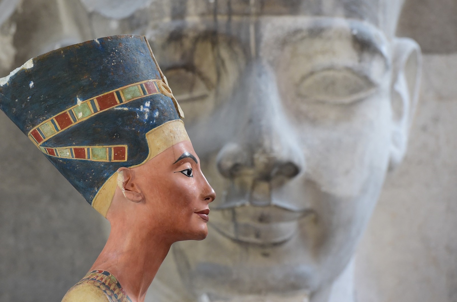 A replica of the bust of Nefertiti stands in front of a the replica of the a Sphinx head at the Replica Workshop of the National Museums of Berlin, in Berlin October 2, 2015. The workshop can produce up to 20 copies of the bust a year, and are sold for EUR 8.900 each. The original bust is on display at Berlin's Neues Museum.,Image: 260764071, License: Rights-managed, Restrictions: , Model Release: no, Credit line: JOHN MACDOUGALL / AFP / Profimedia